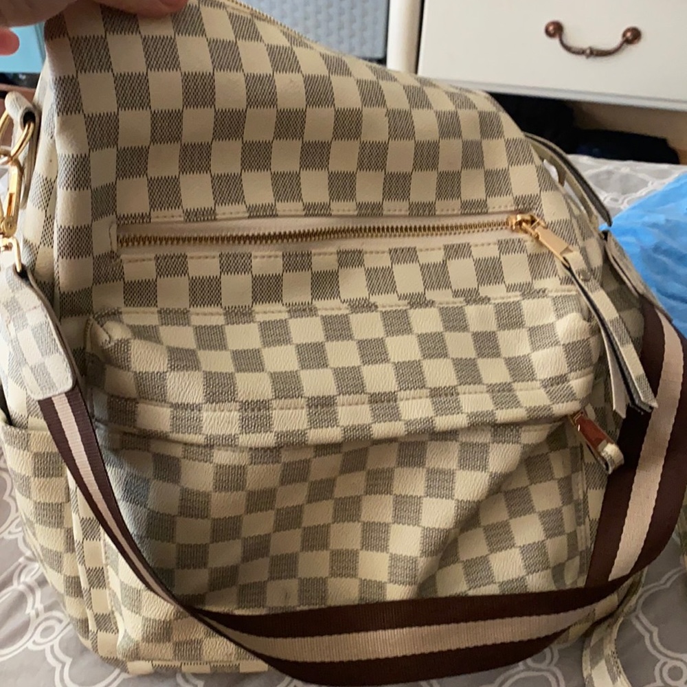 Checkered white leather backpack